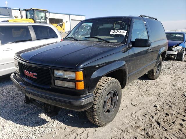 GMC YUKON 1995 with VIN 1GKEK18K0SJ711663 - Photo from auction