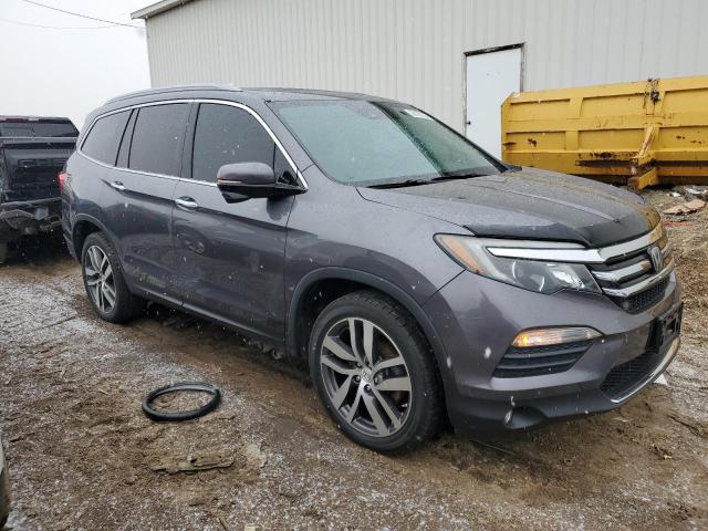 Photo 4 from auction – 2016 HONDA PILOT TOUR with VIN 5FNYF6H98GB058361