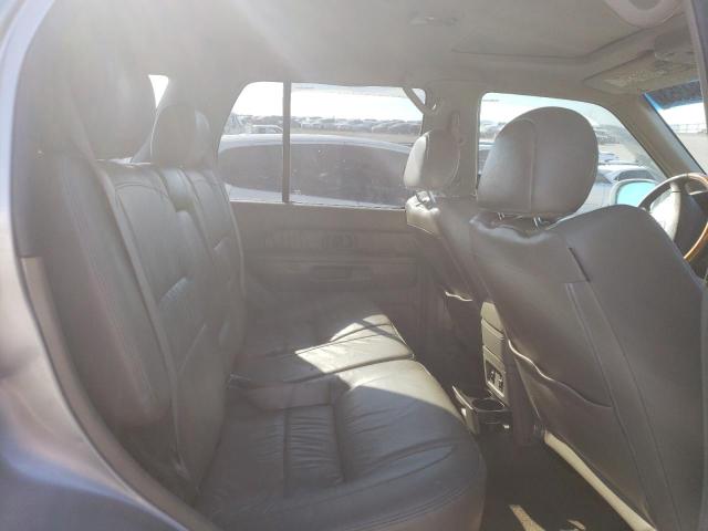 Photo 11 from auction – 2002 INFINITI QX4 with VIN JNRDR09Y32W250641