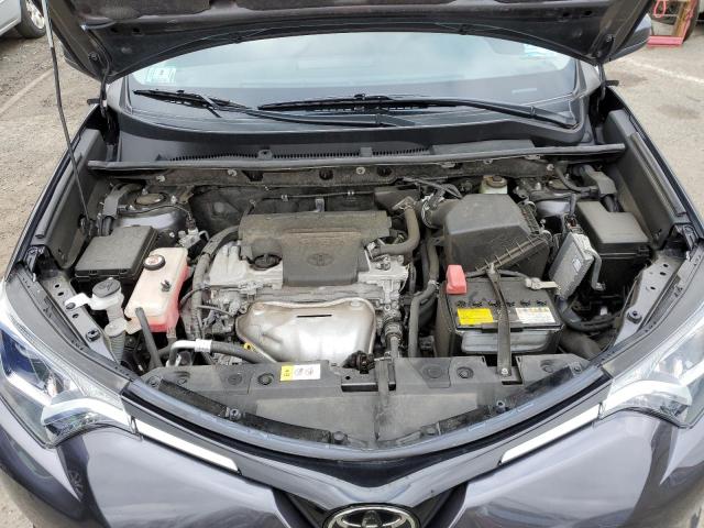 Photo 11 from auction – 2018 TOYOTA RAV4 LE with VIN JTMBFREV7JJ726546