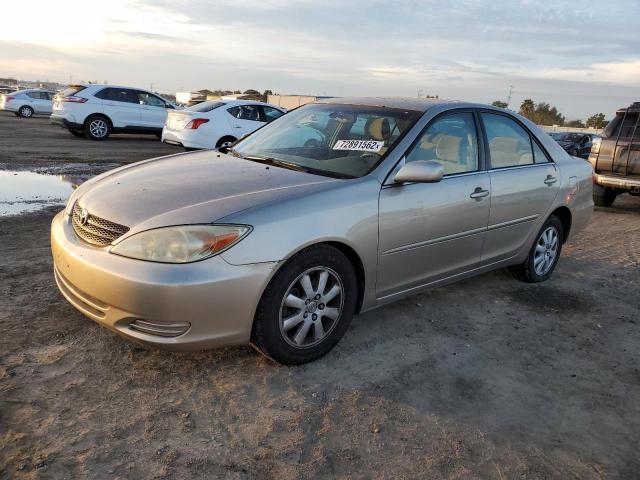 Photo 1 from auction – 2002 TOYOTA CAMRY LE with VIN JTDBF30K920057925