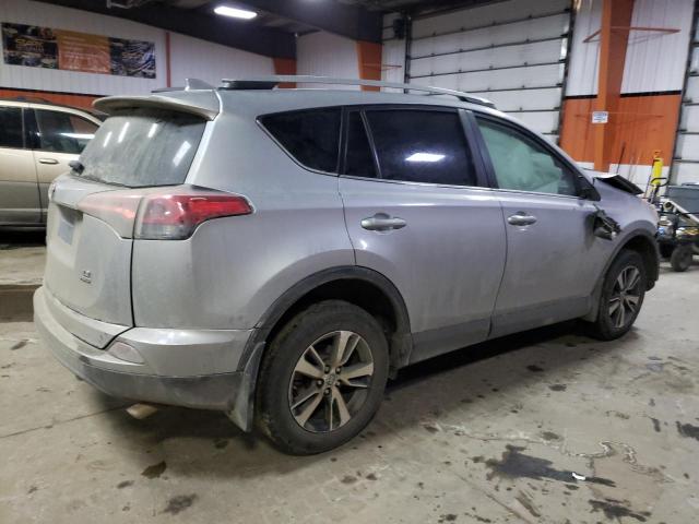 Photo 3 from auction – 2018 TOYOTA RAV4 LE with VIN 2T3BFREV9JW817402