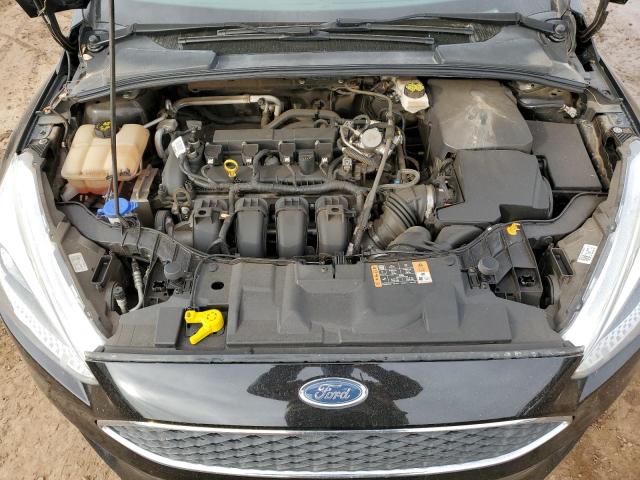 Photo 11 from auction – 2018 FORD FOCUS SE with VIN 1FADP3K29JL214875