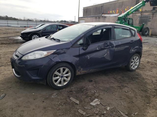 FORD FIESTA SE 2012 with VIN 3FADP4EJ4CM157558 - Photo from auction