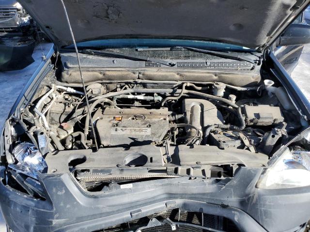 Photo 12 from auction – 2002 HONDA CR-V LX with VIN JHLRD77402C090963