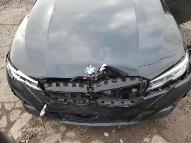 Photo 11 from auction – 2021 BMW M340XI with VIN 3MW5U9J06M8C08714