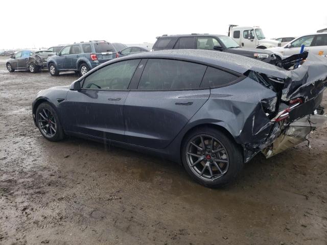 Photo 2 from auction – 2021 TESLA MODEL 3 with VIN 5YJ3E1EB5MF001084