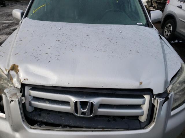 Photo 12 from auction – 2006 HONDA PILOT EX with VIN 2HKYF185X6H526445