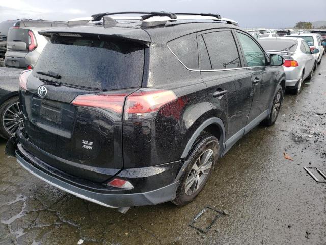 Photo 3 from auction – 2016 TOYOTA RAV4 XLE with VIN 2T3RFREV5GW537919