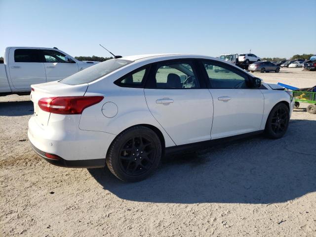 Photo 3 from auction – 2016 FORD FOCUS SE with VIN 1FADP3F24GL299711