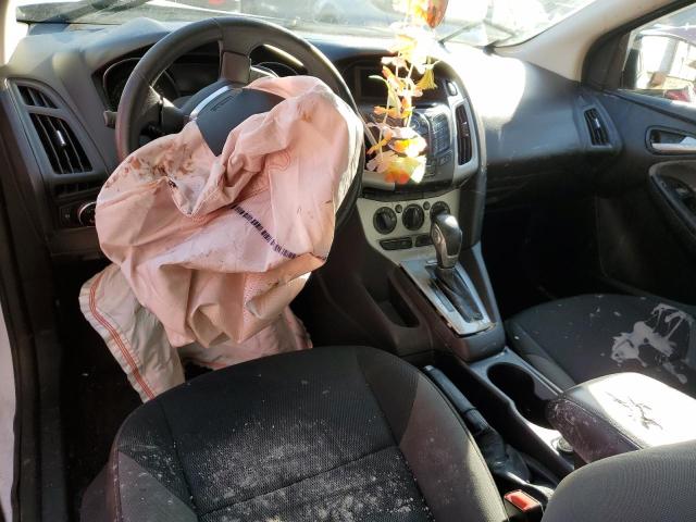 Photo 8 from auction – 2014 FORD FOCUS SE with VIN 1FADP3F25EL282574