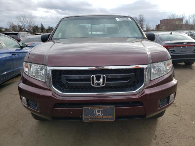 Photo 5 from auction – 2011 HONDA RIDGELINE with VIN 5FPYK1F23BB001019