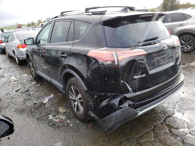 Photo 2 from auction – 2016 TOYOTA RAV4 XLE with VIN 2T3RFREV5GW537919