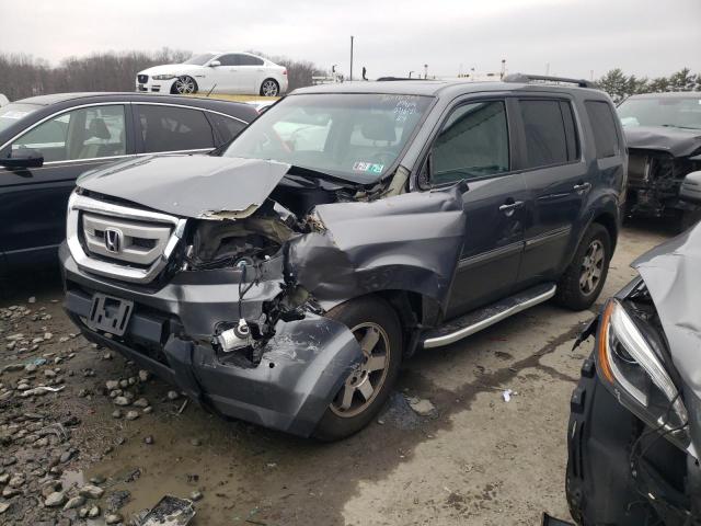 HONDA PILOT TOUR 2010 with VIN 5FNYF3H97AB015247 - Photo from auction