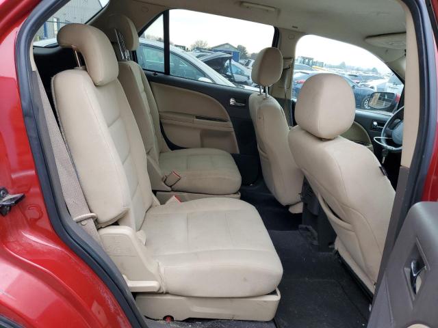 Photo 11 from auction – 2009 FORD TAURUS X S with VIN 1FMDK02W79GA06181