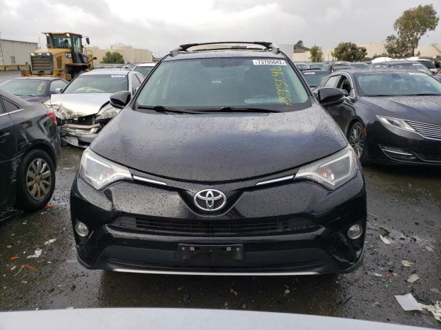 Photo 5 from auction – 2016 TOYOTA RAV4 XLE with VIN 2T3RFREV5GW537919