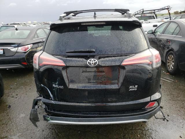 Photo 6 from auction – 2016 TOYOTA RAV4 XLE with VIN 2T3RFREV5GW537919