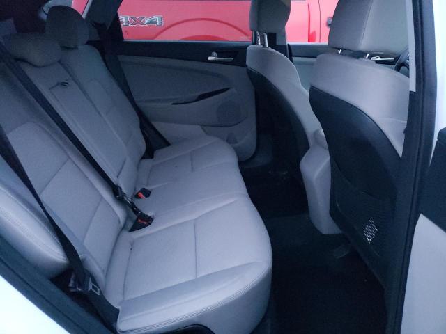 Photo 11 from auction – 2019 HYUNDAI TUCSON SE with VIN KM8J2CA42KU013874