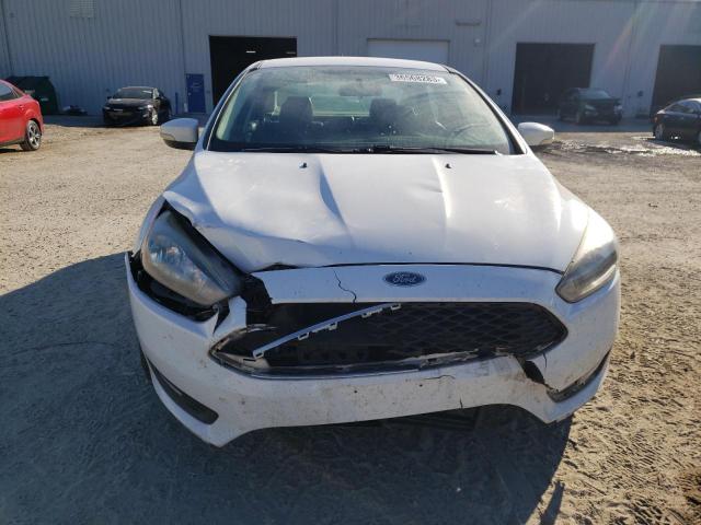 Photo 5 from auction – 2016 FORD FOCUS SE with VIN 1FADP3F24GL299711