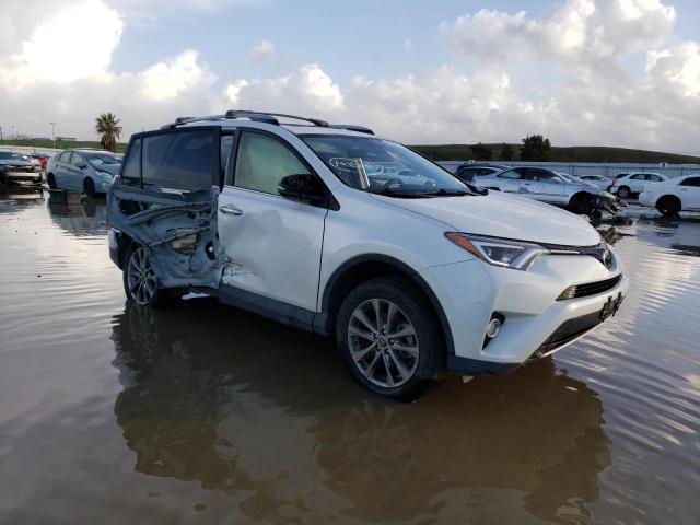 Photo 4 from auction – 2018 TOYOTA RAV4 LIMIT with VIN JTMDFREVXJJ718756