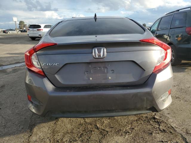 Photo 6 from auction – 2018 HONDA CIVIC EX with VIN 19XFC2F78JE204765