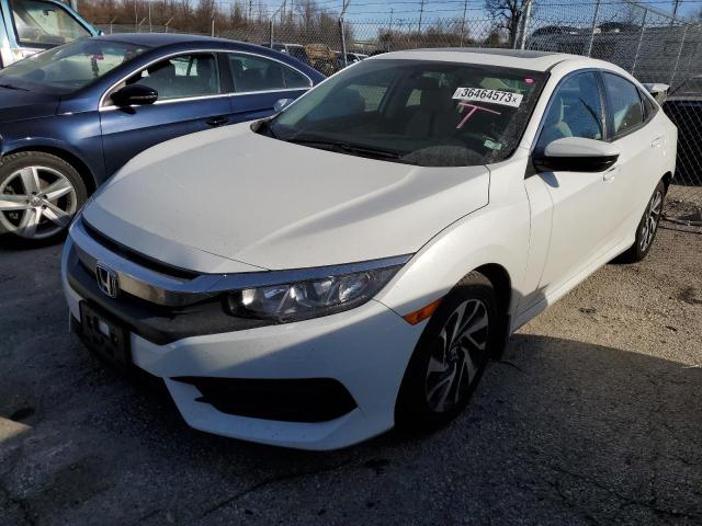 HONDA CIVIC EX 2018 with VIN 19XFC2F75JE021131 - Photo from auction