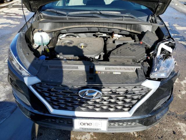 Photo 12 from auction – 2020 HYUNDAI TUCSON SE with VIN KM8J2CA48LU111566