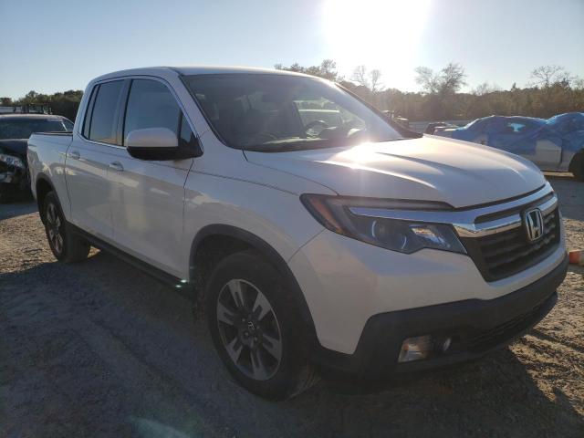 Photo 4 from auction – 2017 HONDA RIDGELINE with VIN 5FPYK2F59HB007237