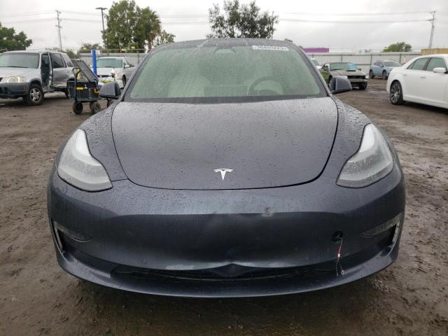 Photo 5 from auction – 2021 TESLA MODEL 3 with VIN 5YJ3E1EB5MF001084