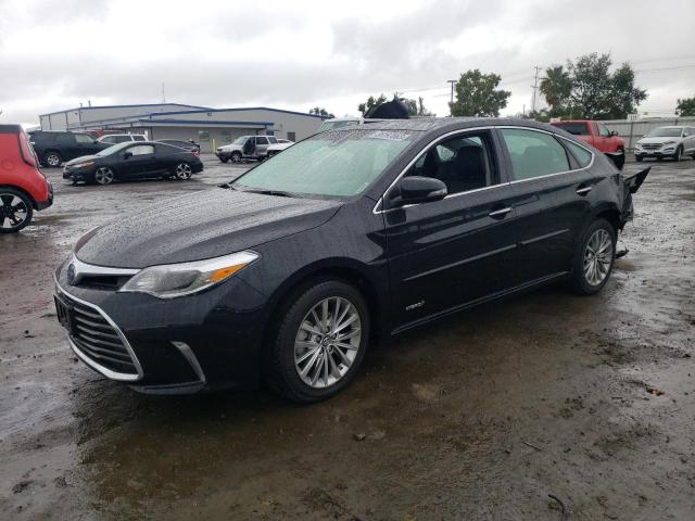 TOYOTA AVALON HYB 2018 with VIN 4T1BD1EB8JU063737 - Photo from auction