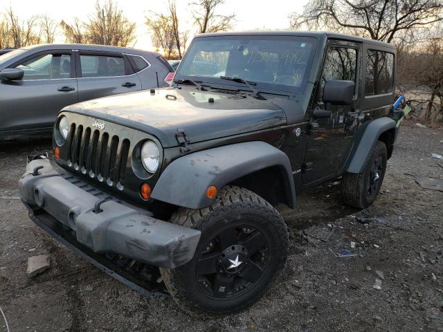 JEEP WRANGLER S 2011 with VIN 1J4GA2D1XBL501547 - Photo from auction