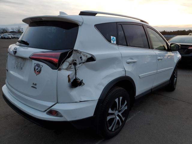 Photo 3 from auction – 2018 TOYOTA RAV4 LE with VIN JTMBFREV8JJ217484