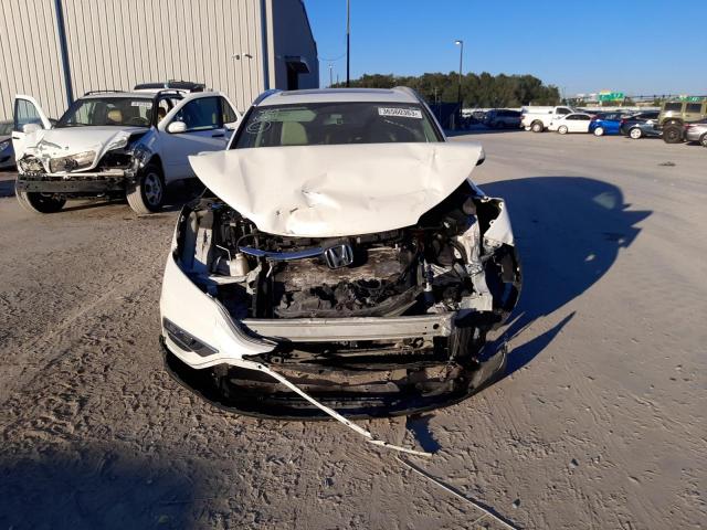 Photo 5 from auction – 2016 HONDA CR-V EXL with VIN 5J6RM4H72GL050096