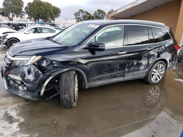 HONDA PILOT TOUR 2016 with VIN 5FNYF5H91GB026345 - Photo from auction