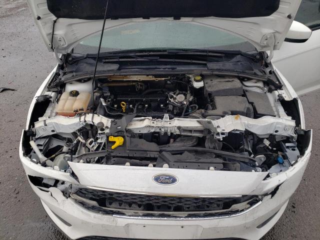 Photo 11 from auction – 2018 FORD FOCUS SE with VIN 1FADP3K27JL269065