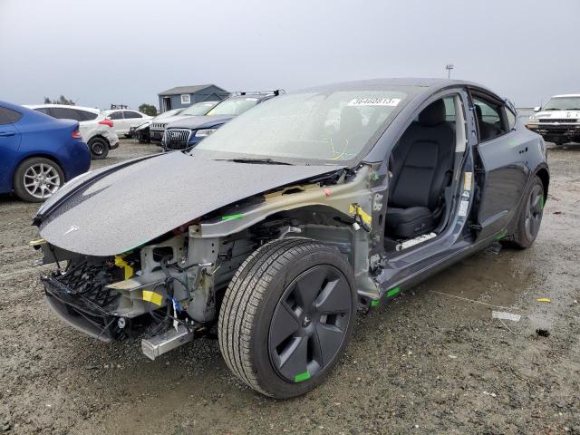 TESLA MODEL 3 2022 with VIN 5YJ3E1EB3NF201785 - Photo from auction
