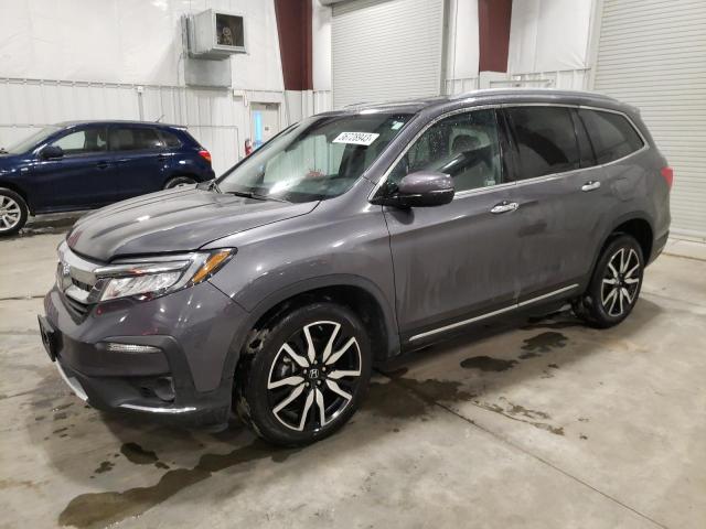 HONDA PILOT TOUR 2020 with VIN 5FNYF6H65LB005164 - Photo from auction