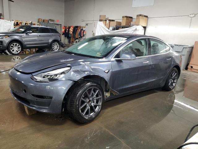TESLA MODEL 3 2018 with VIN 5YJ3E1EA9JF041753 - Photo from auction