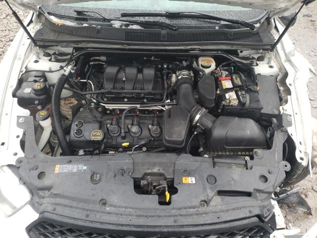 Photo 11 from auction – 2014 FORD TAURUS POL with VIN 1FAHP2MK7EG157972