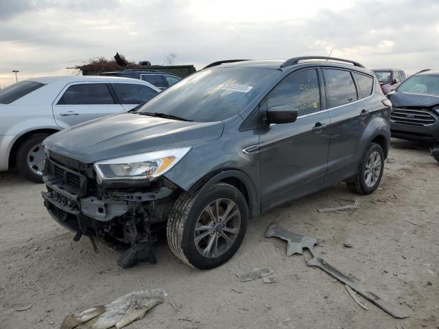 FORD ESCAPE SE 2018 with VIN 1FMCU9GD4JUD57993 - Photo from auction
