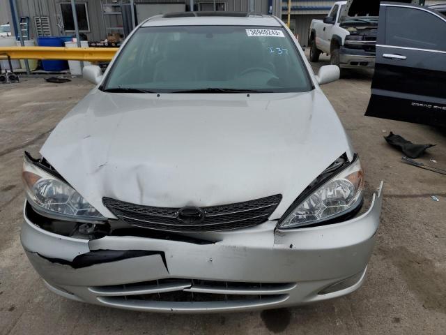 Photo 5 from auction – 2004 TOYOTA CAMRY LE with VIN 4T1BE30K04U870712