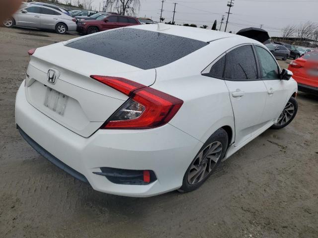 Photo 3 from auction – 2018 HONDA CIVIC EX with VIN 2HGFC2F70JH525169