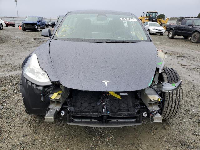 Photo 5 from auction – 2022 TESLA MODEL 3 with VIN 5YJ3E1EB3NF201785