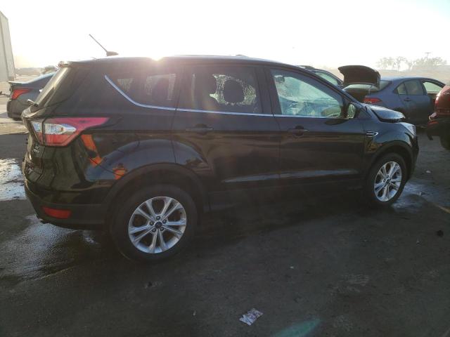 Photo 3 from auction – 2017 FORD ESCAPE SE with VIN 1FMCU9GD1HUE82220
