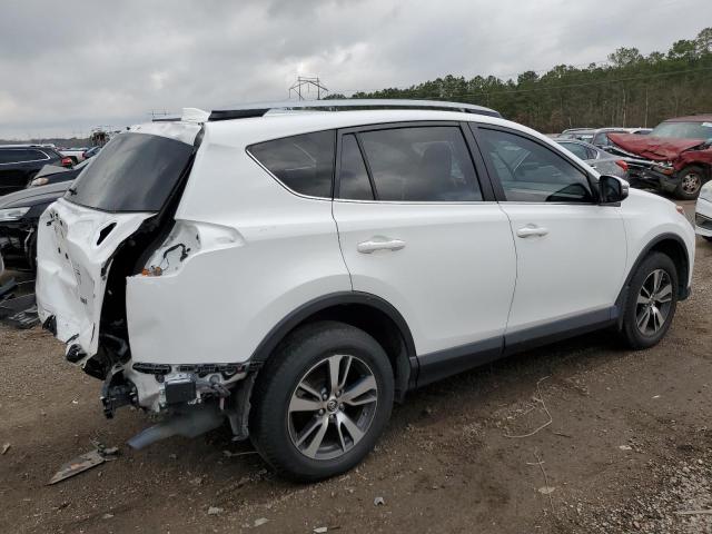 Photo 3 from auction – 2017 TOYOTA RAV4 XLE with VIN JTMWFREV3HD097779