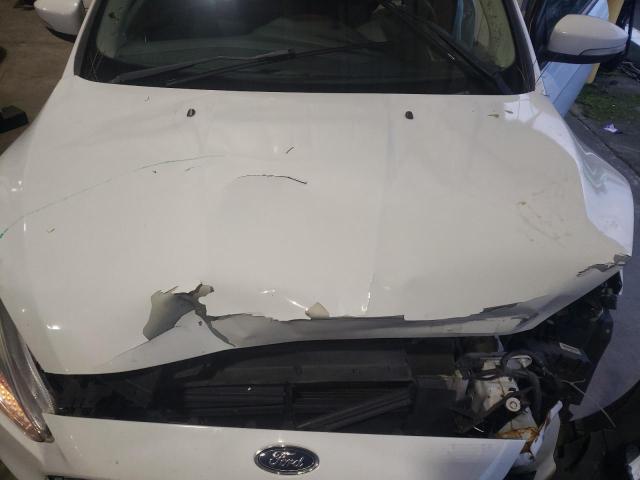Photo 11 from auction – 2015 FORD FOCUS SE with VIN 1FADP3K2XFL242126