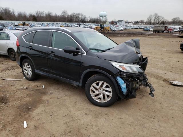 Photo 4 from auction – 2015 HONDA CR-V EXL with VIN 2HKRM4H71FH659141
