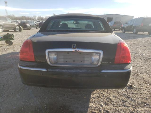 Photo 6 from auction – 2004 LINCOLN TOWN CAR E with VIN 1LNHM81W44Y617526