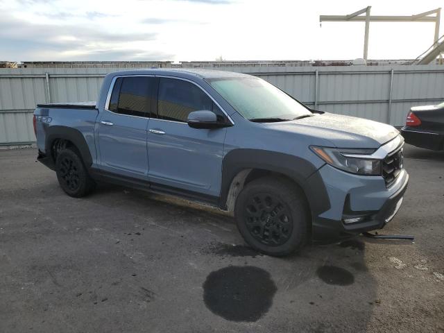 Photo 4 from auction – 2022 HONDA RIDGELINE with VIN 5FPYK3F71NB022074