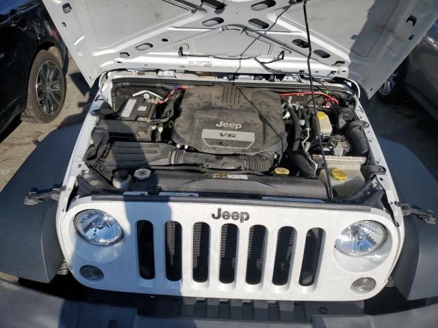 Photo 11 from auction – 2015 JEEP WRANGLER U with VIN 1C4BJWDG4FL675163
